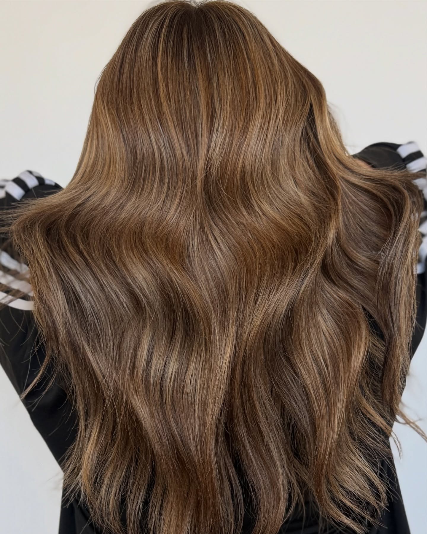 Balayage color-melt hairstyle at The Hair Co. Salon